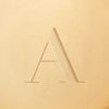 Stamped - Initial Icon (Gold)