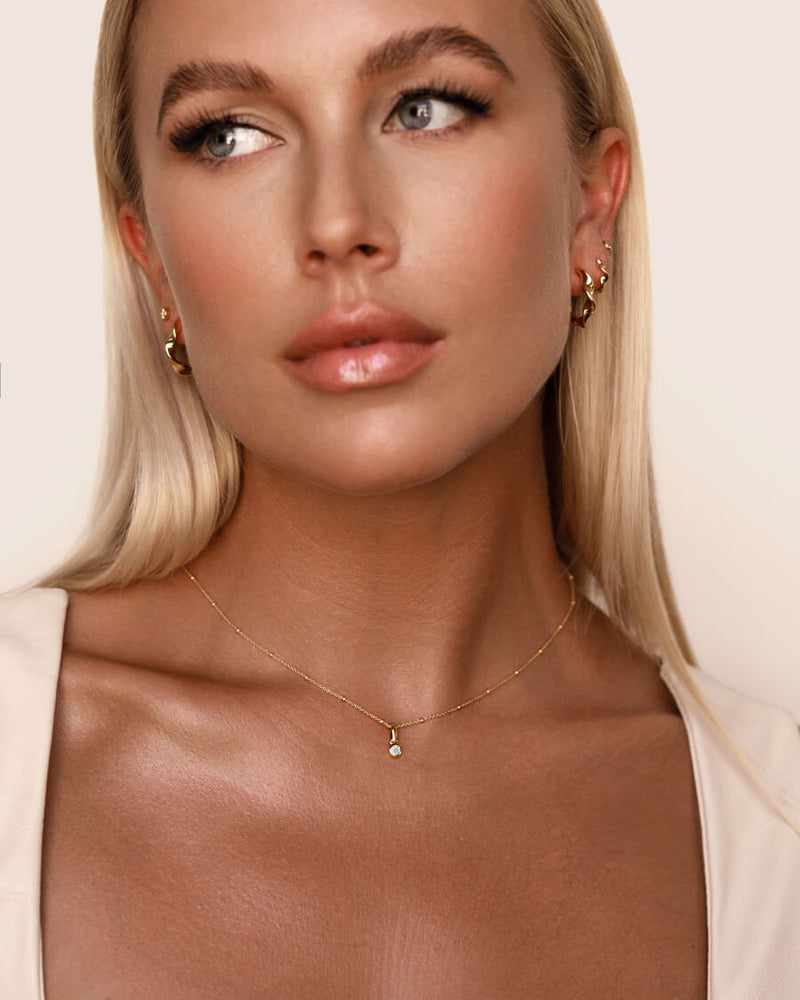 Sterling Silver Twisted Huggie Hoops (Gold)